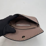 VALENTINO ROCKSTUD POUDRE PEBBLED LEATHER TOP HANDLE MINI CROSSBODY