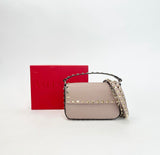 VALENTINO ROCKSTUD POUDRE PEBBLED LEATHER TOP HANDLE MINI CROSSBODY