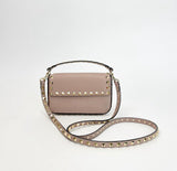 VALENTINO ROCKSTUD POUDRE PEBBLED LEATHER TOP HANDLE MINI CROSSBODY