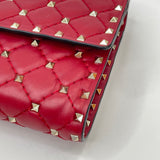 VALENTINO ROCKSTUD CROSSBODY/ CLUTCH  IN RED LMBSKN LEA & GHW