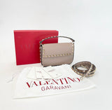 VALENTINO ROCKSTUD POUDRE PEBBLED LEATHER TOP HANDLE MINI CROSSBODY