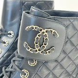 CHANEL BLK QUILTED LEA COMBAT BOOTS SZ 37.5