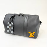LIMITED EDITION LOUIS VUITTON CITY KEEPALL CROSSBODY IN BLK TAURILLON LEA - BLuxe Boutique