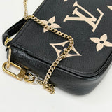 LOUIS VUITTON MINI POCHETTE ACCESSORIES IN BI-COLOR EMPREINTE LEA