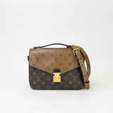 LOUIS VUITTON POCHETTE METIS IN REVERS MONO & GHW - BLuxe Boutique