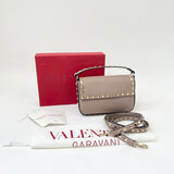 VALENTINO ROCKSTUD POUDRE PEBBLED LEATHER TOP HANDLE MINI CROSSBODY