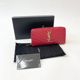 SAINT LAURENT CASSANDRE MATELASSE ZIP LONG WALLET IN RED GRAIN DE POUDRE LEA & GHW