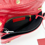 BALENCIAGA LE CITY CLUTCH ON STRAP IN RED ARENA LMBSKIN LEA & GHW