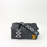 LIMITED EDITION LOUIS VUITTON CITY KEEPALL CROSSBODY IN BLK TAURILLON LEA - BLuxe Boutique