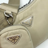 PRADA RE EDITION 2005 CROSSBODY IN DESSERT BEIGE NYLON & SHW