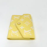 LIMITED EDITION LOUIS VUITTON WALLET IN YELLOW MONO EMPREINTE LEA