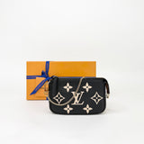 LOUIS VUITTON MINI POCHETTE ACCESSORIES IN BI-COLOR EMPREINTE LEA