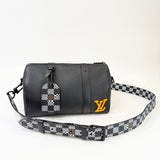 LIMITED EDITION LOUIS VUITTON CITY KEEPALL CROSSBODY IN BLK TAURILLON LEA - BLuxe Boutique
