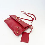 BALENCIAGA LE CITY CLUTCH ON STRAP IN RED ARENA LMBSKIN LEA & GHW