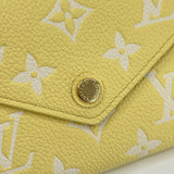 LIMITED EDITION LOUIS VUITTON WALLET IN YELLOW MONO EMPREINTE LEA