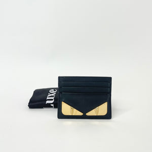 FENDI VITELLO LIBERTY LUCIDO GOLD METAL MONSTER EYES BLK CARD HOLDER