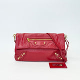 BALENCIAGA LE CITY CLUTCH ON STRAP IN RED ARENA LMBSKIN LEA & GHW