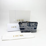 CHRISTIAN DIOR DIORTRAVEL NOMAD POUCH IN BLUE TOILE DE JOUY REVERSE TECHNICAL FABRIC