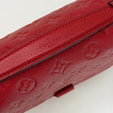 LOUIS VUITTON POCHETTE METIS IN RED EMPREINTE LEA & GHW - BLuxe Boutique