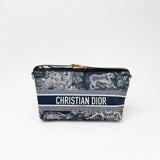 CHRISTIAN DIOR DIORTRAVEL NOMAD POUCH IN BLUE TOILE DE JOUY REVERSE TECHNICAL FABRIC