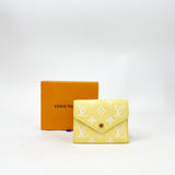 LIMITED EDITION LOUIS VUITTON WALLET IN YELLOW MONO EMPREINTE LEA