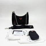 PRADA RE EDITION 2005 CROSSBODY IN BLK NYLON & RED HW