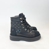 CHANEL BLK LEA & CAP TOE LACE UP COMBAT BOOTS SZ 38.5