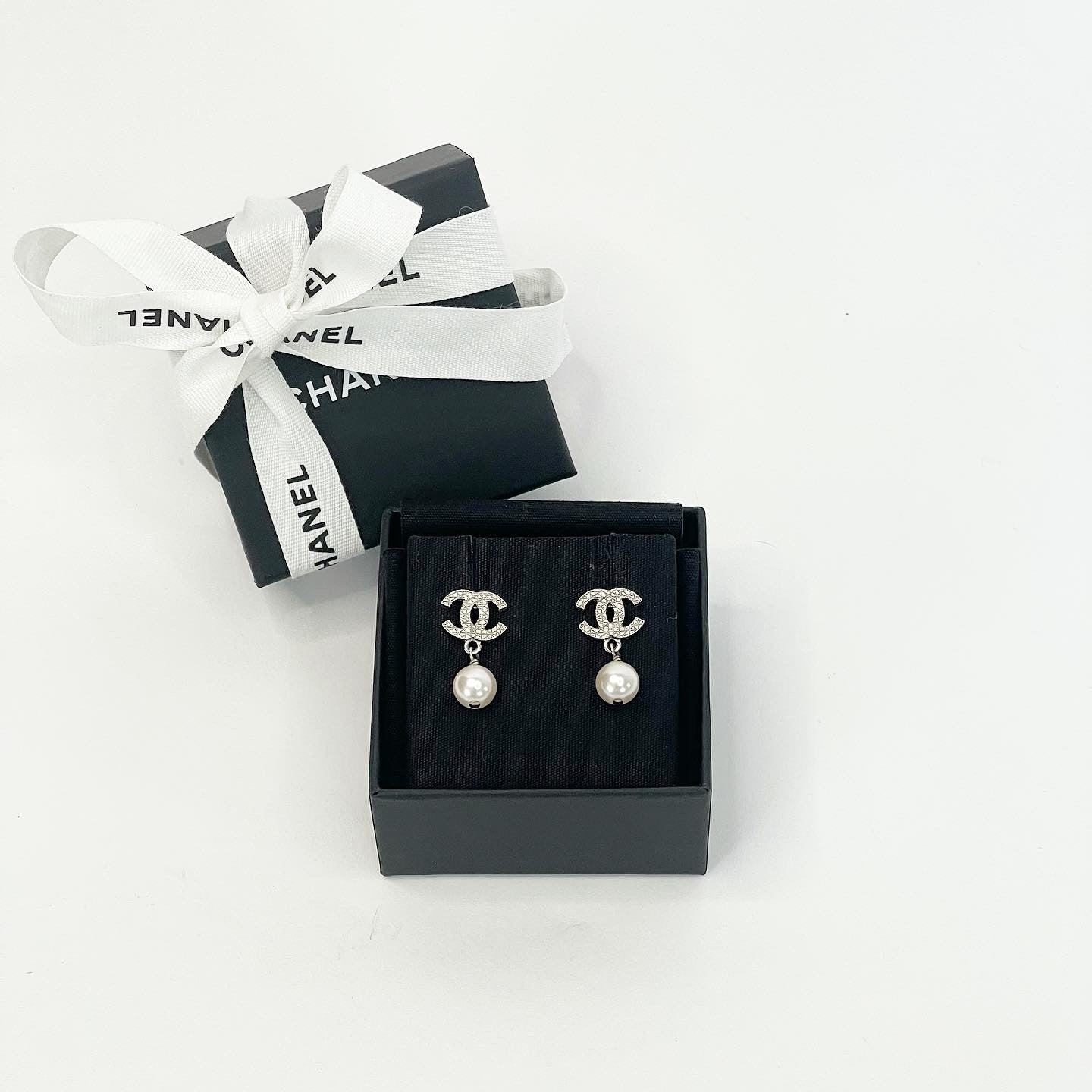 Chanel CC Drop Earrings Crystal Pearl Silver – The Accessory Circle by X  Terrace